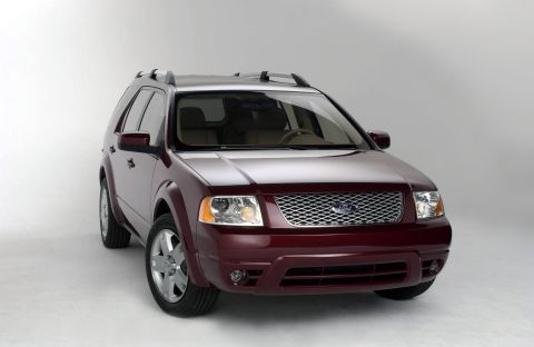 1999 Ford Taurus - Maroon Ford Freestyle SUV parked against a white background.