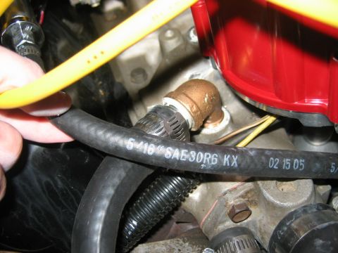 1985 Ford Crown Victoria LTD - Engine components with visible hose markings and a date stamp of 02 15 05.