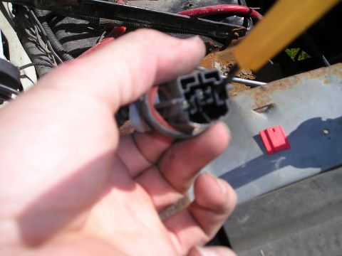 1990 Ford Bronco - use a tool to release pins
