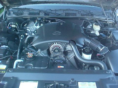 1999 Ford Crown Victoria - The engine bay of a Ford Crown Victoria, likely a 2000 model, is visible with the hood open.