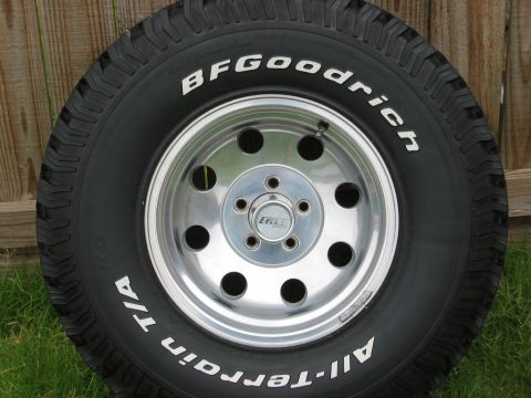 1986 Ford Bronco - BFGoodrich All-Terrain T/A tire and chrome wheel assembly.