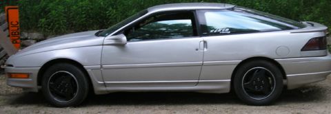 1990 Ford Probe - This 1990 Ford Probe is captured in a side profile, its coupe body style.
