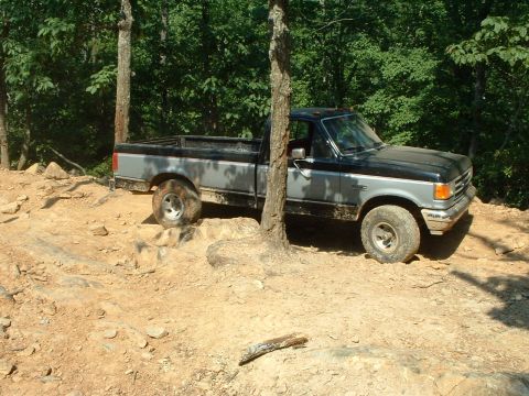1985 Ford Bronco - This Ford F-Series pickup truck appears to be from the late 1980s, not a 1985 Bronco.