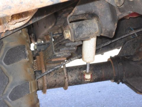 1994 Ford Bronco - This image shows the undercarriage of a vehicle, focusing on the suspension and axle components.