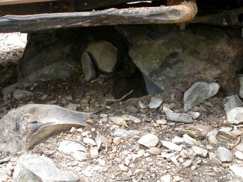 1990 Ford Bronco - Uprooted this rock with my radius arm drop bracket. Also, more evidence that a nerf bar does not a slider make.