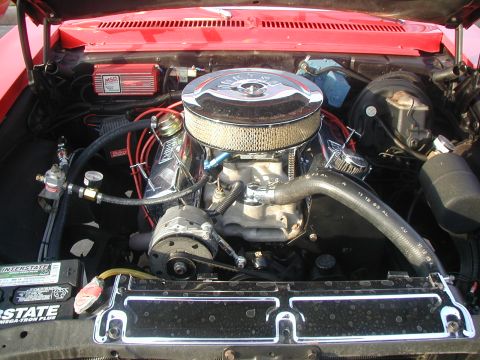 2000 Ford Crown Victoria - The engine bay features a chrome air cleaner, an MSD ignition box, and an Interstate battery.