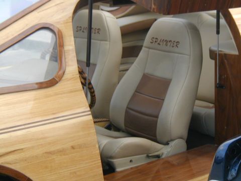 2000 Ford Crown Victoria - Interior view of a custom vehicle wood paneling and 'SPLINTER' embroidered seats.