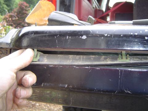 1989 Ford Bronco - Removing tailgate window seal clips on a 1989 Ford Bronco.