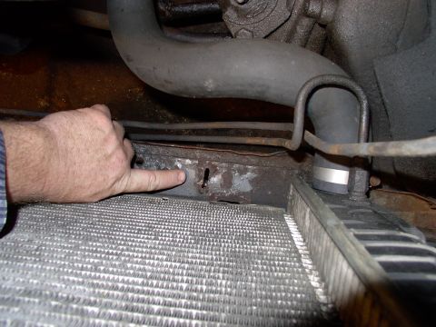 1986 Ford Bronco - Here's one of the slots cut in the lower fan support to accept the tab on the bottom of the angle iron.