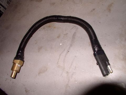 1986 Ford Bronco - I cut and lengthened the supplied wet sensor's wires to reach the T-stat housing, which has a threaded provision. The taped on wiring convo…
