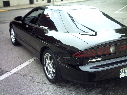 Black 1995 Ford Probe rear view with honeycomb taillights