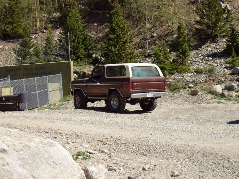 1979 Ford Bronco - This 1979 Ford Bronco is seen parked on a gravel road near a tunnel entrance.