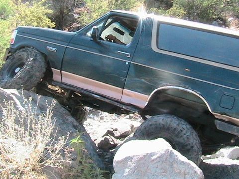1994 Ford Bronco - This 1994 Ford Bronco is navigating a rocky trail.