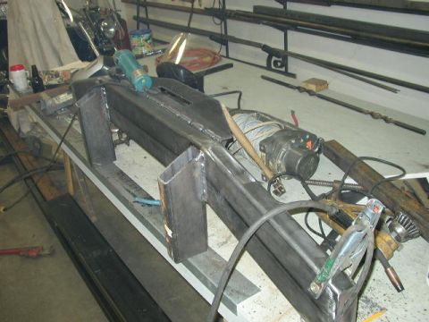 1995 Ford Bronco - Custom winch bumper fabrication in progress, showing welding and winch components.