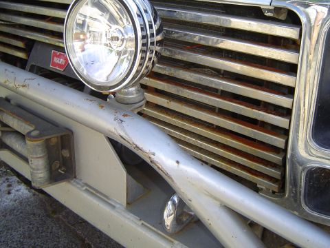 1979 Ford Bronco - This vehicle features a WARN winch and a large spotlight mounted on its front bumper.