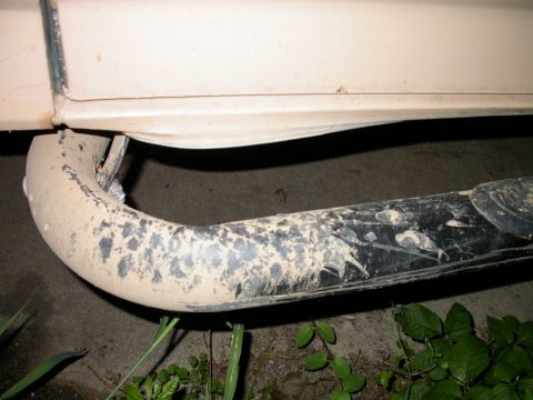 1990 Ford Bronco - Bent out rocker sheet metal and bent to hell mounting of the nerf bar.