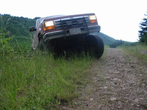 1991 Ford Explorer - This 1991 Ford Explorer navigates a rough, grassy dirt road during a trip.