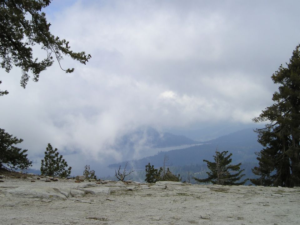 Mountain landscape with clouds and trees, Supermotors.net logo