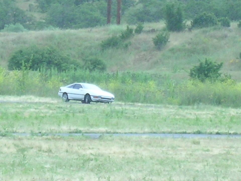 1993 Ford Probe, white coupe, 3q-front view