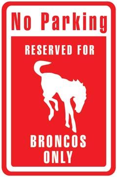 1986 Ford Bronco - A sign indicates parking is reserved exclusively for Broncos, a silhouette of a horse.