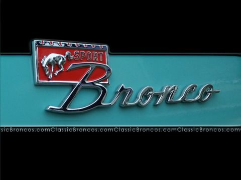 1986 Ford Bronco - Close-up of the Bronco Sport emblem, a horse graphic and chrome lettering.