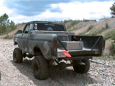 1977 Ford F-150 - This 1977 Ford F-150 pickup truck is modified with a lifted suspension and a large fuel tank in the bed.