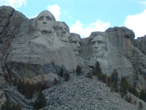 1992 Ford Probe - Mount Rushmore National Memorial features carved faces of four US presidents.