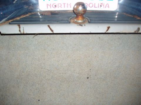 1994 Ford Bronco - Close-up of a tow hitch ball on a 1994 Ford Bronco, with a North Carolina license plate visible above.