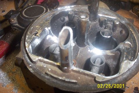 1979 Ford F-150 - This is a close-up view of a carburetor, likely undergoing maintenance or repair.