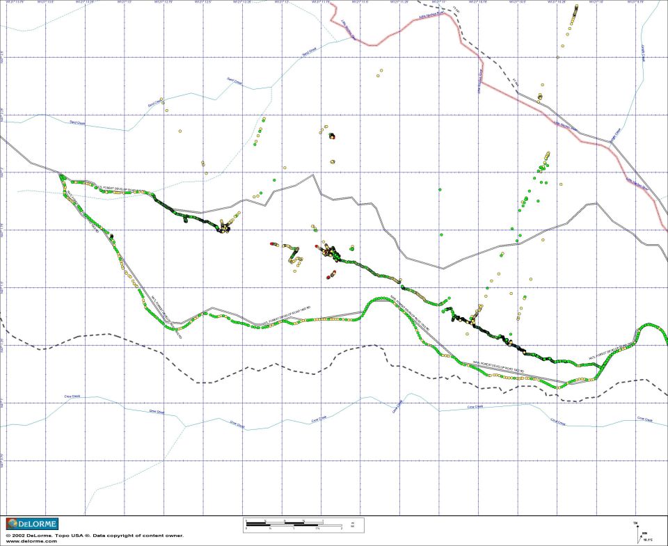 DeLorme topo map with green and black GPS tracks and scattered waypoints
