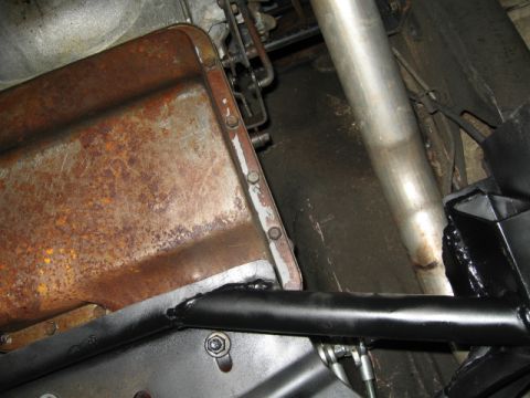 1976 Ford F-150 - A bad shot, but here is the brace added in. It is NOT mounted to the lower Radius arm mount, so I can still remove it.