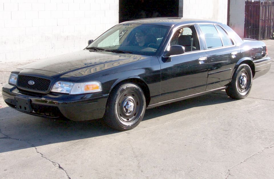 Black 2003 Ford Crown Victoria sedan, 3q front view