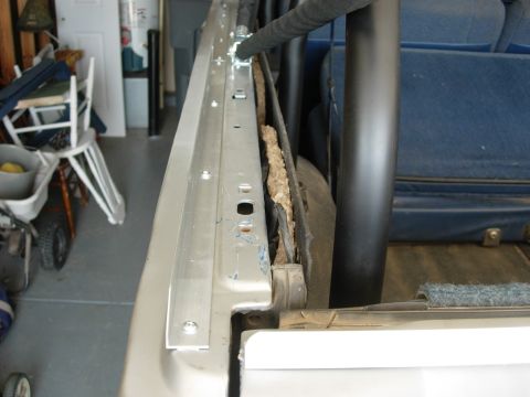 1995 Ford Bronco - body aluminum - view from the back corner of the tailgate.