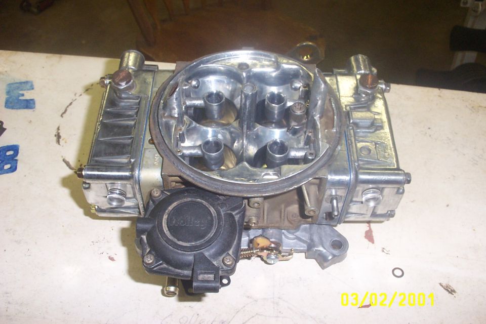 Holley carburetor with four barrels and chrome accents