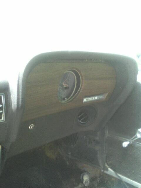 2001 Ford Taurus - Interior view of a dashboard showing a gauge and air vent with 'MACH 1' badging.