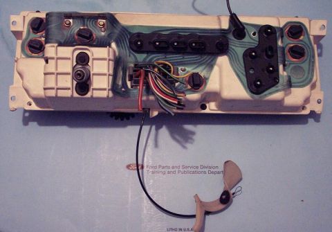1985 Ford LTD Crown Victoria - Wiring harness and connectors on the back of an automotive instrument cluster.