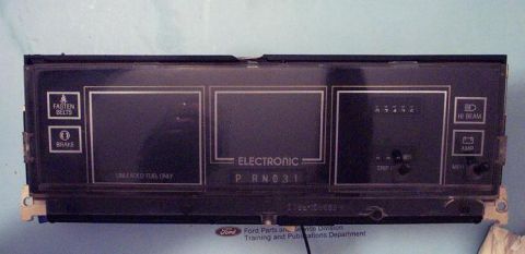 1985 Ford LTD Crown Victoria - This electronic instrument cluster shows the gear selection and has indicators for seat belts and brake.