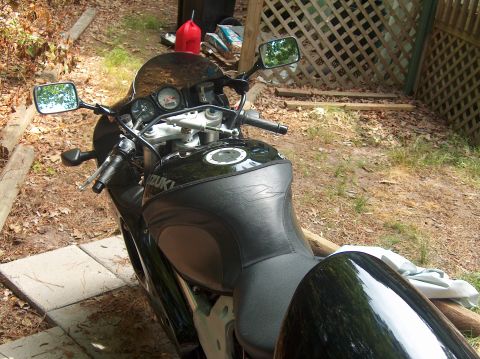 2002 Suzuki TL1000R - A black Suzuki motorcycle is parked outdoors. The 'SUZUKI' text is visible on the fuel tank.