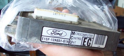 1985 Ford LTD Crown Victoria - Ford microcomputer control unit, part number E1SF-12A651-G1A, is held in a plastic bag.