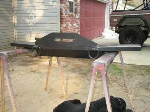 1995 Ford Bronco - Custom steel bumper with D-rings, likely for an off-road vehicle, is shown on sawhorses.
