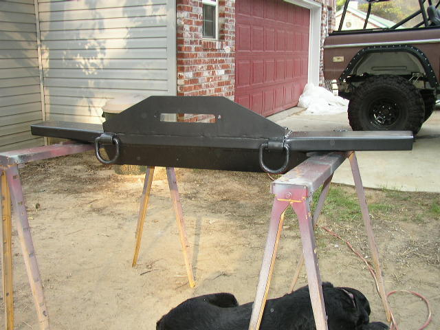 Custom steel bumper with D-rings, mounted on sawhorses