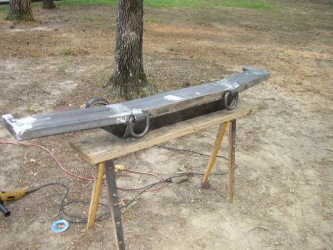 1995 Ford Bronco - A custom-fabricated steel bumper with integrated tow rings is shown on sawhorses.