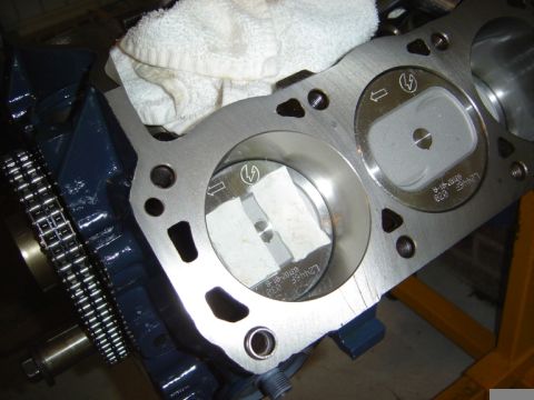 1986 Ford Bronco - Close-up view of an engine block, piston, and cylinder head, likely during a rebuild or swap.