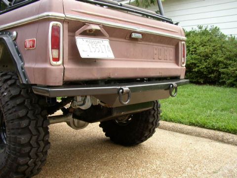 1995 Ford Bronco - Custom rear bumper installed on a 1978 Ford Bronco, showing off-road tire and Mississippi license plate.