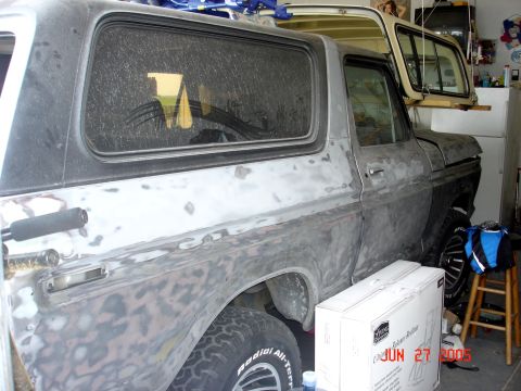 1979 Ford Bronco - This Ford Bronco appears to be undergoing bodywork, with its top detached and stored above.