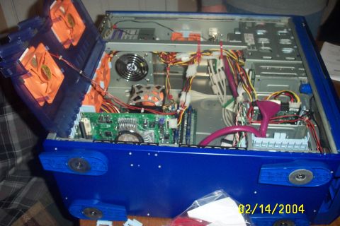 1979 Ford F-150 - The interior of a blue computer case is visible, showing fans, wiring, and circuit boards. A date stamp reads 02/14/2004.