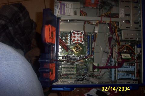 1979 Ford F-150 - Internal components of a computer tower are visible, including the motherboard and cooling fans.