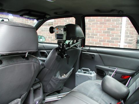 1992 Ford Taurus - The interior of a 1992 Ford Taurus is equipped with a video camera rig and a Pelican case.