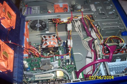 1979 Ford F-150 - Internal view of a computer tower showing components and wiring, dated February 14, 2004.