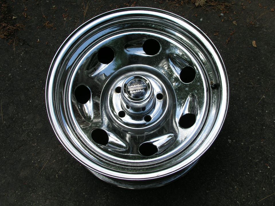 Chrome American Racing wheel with 5 lug holes